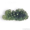 Pierre d'ouverture du cœur, magnifiquement découpée, la Moldavite de Besednice est très rare et recherchée